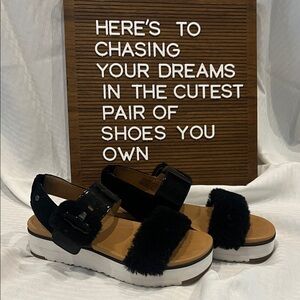 UGG Black Fuzzy and Tan Sandals